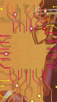 Vertical video: Cam panning, player holding ball helmet tilting circuit sweeping over him for sport