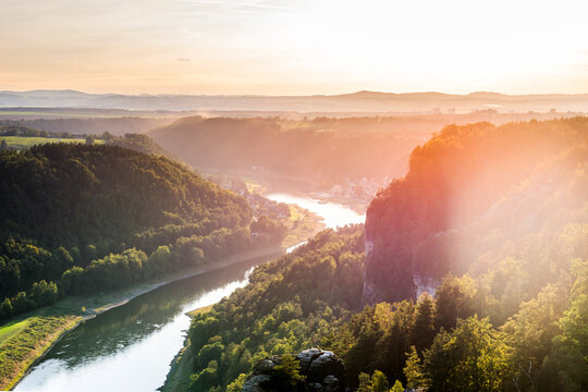 Scenic sunrise over river valley in Saxon Switzerland