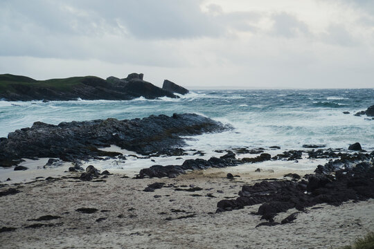Rough sea and rocky coastline in the Scottish Highlands