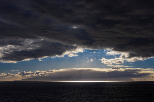 Dramatic storm clouds over La Gomera and the Atlantic Ocean