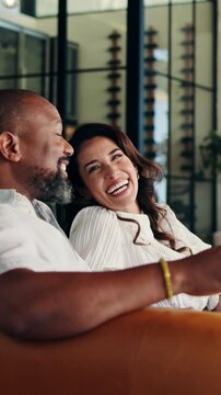 Relax, couple and man with discussion on sofa, funny conversation and laughing for weekend bonding. Chill, gossip and mature people with joke for connection, smile or interracial relationship in home