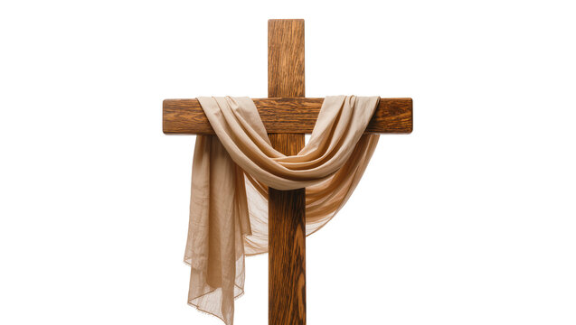 Rustic wooden cross draped with flowing beige fabric