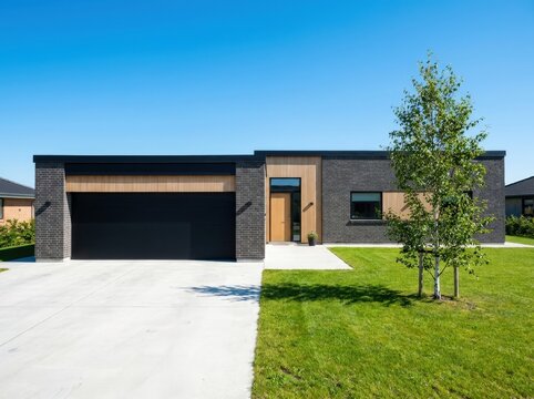 Modern Single Story Black Brick House with Garage and Green Lawn-(Rumah Bata Hitam Satu Lantai Modern dengan Garasi dan Halaman Hijau)