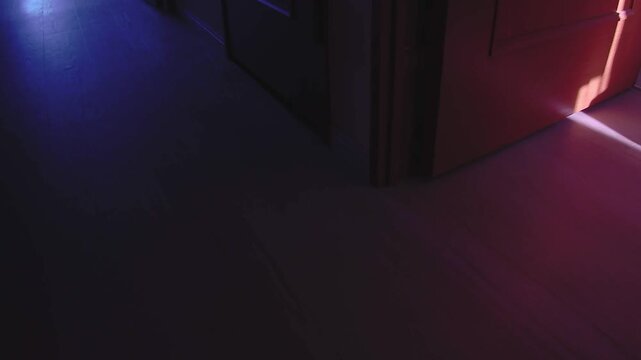Warm and cool light reflecting along a hallway in a Japanese home, calm everyday interior with contrast lighting for lifestyle and design use