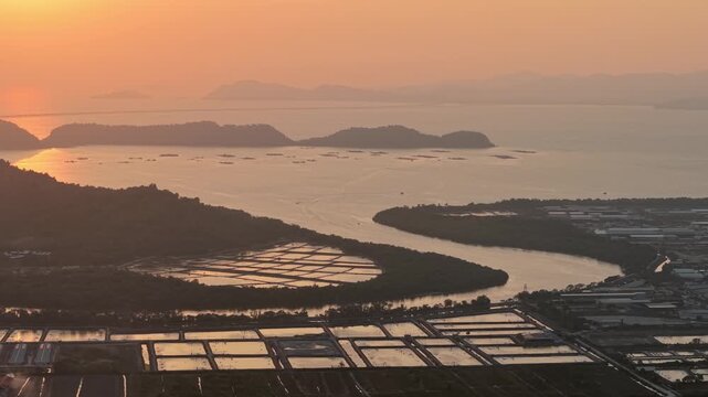 Sunset Over Pulau Aman Coastal Ponds and Estuary