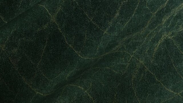 Subtle flowing movement of waves of cotton fabric with marble pattern in seamless loop delivering elegant abstract luxury texture for visuals