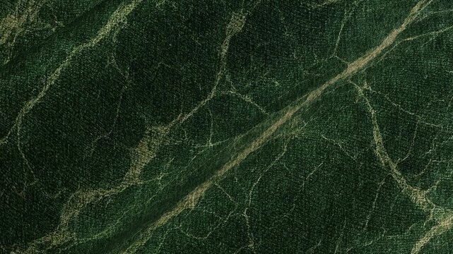 Natural flowing movement of waves of cotton fabric with marble pattern in continuous loop delivering elegant abstract luxury surface