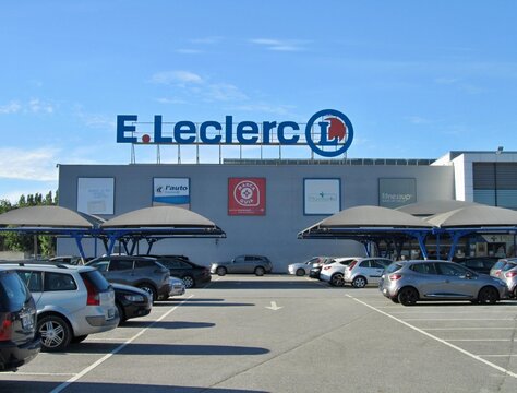 E.Leclerc hypermarket building with parked cars