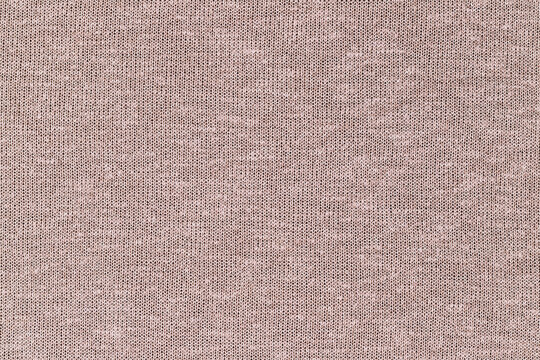 Tight weave fabric of light color shows texture and pattern in simple design for various uses in crafting and sewing projects
