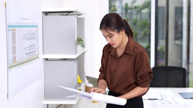 Enginee working with drawings inspection reviews  shop drawing construction Blueprint. Engineer, Architectural concept.