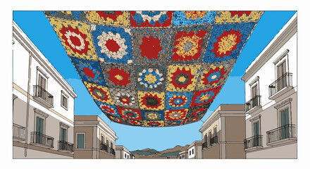 Obraz premium Colorful crocheted canopy stretches between buildings on a sunny day