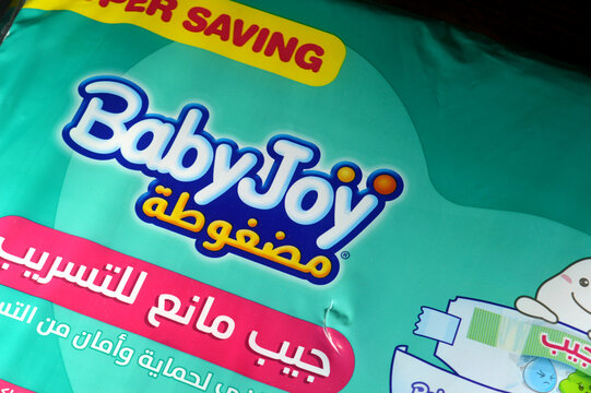 Cairo, Egypt, April 20 2026: BabyJoy Compressed diapers with back leakage stopper , Size 4, from 10Kg to 18Kg, Jumbo pack, 80 Diapers, Unicharm, BabyJoy, Unicharm, Baby Joy diaper pack