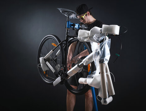 Close-up of Person Assembling a New Bicycle
