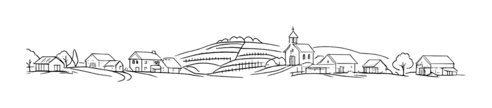 Rural village with church and houses in rolling hills
