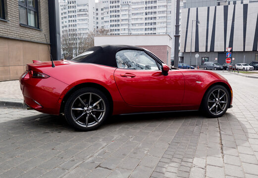 red Mazda MX-5 Miata convertible