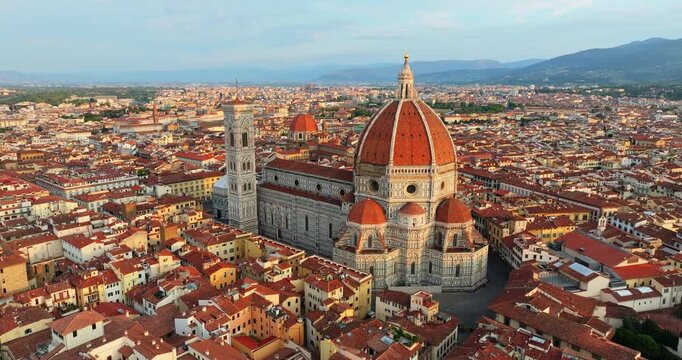 Cathedral of Saint Mary of Flower Florence Italy aerial. Medieval architecture city skyline red tiled roofs summer day. Historic landmark cultural heritage exploration Italian tourism destination