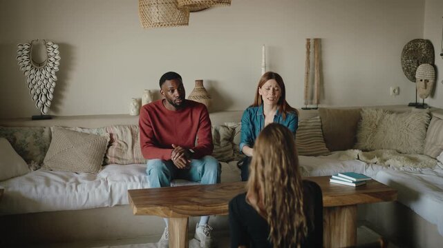 Couple Therapy Session with Psychologist. Interracial Couple in Therapy Session Resolving Relationship Conflict and Reaching Emotional Reconciliation
