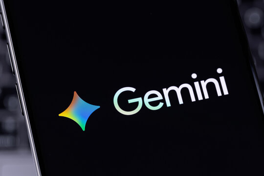 Google Gemini logo closeup mobile app on a screen smartphone iPhone. Gemini is an AI assistant from Google. Batumi, Georgia - March 20, 2026