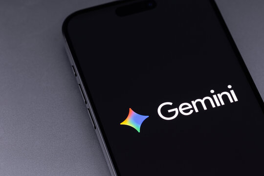 Google Gemini logo mobile app on a screen smartphone iPhone. Gemini is an AI assistant from Google. Batumi, Georgia - March 20, 2026