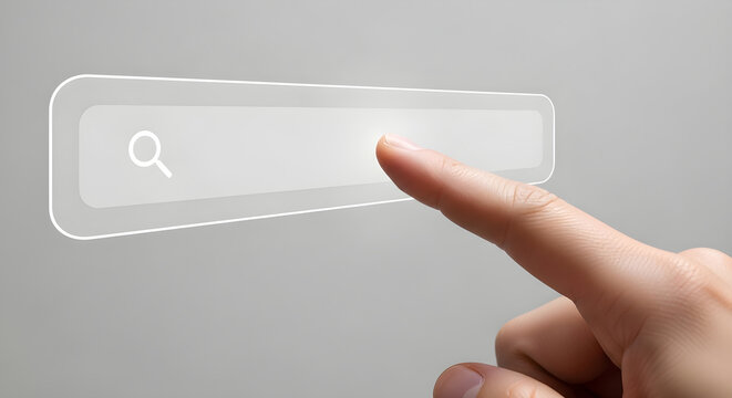 A hand interacts with a search bar on a gray background
