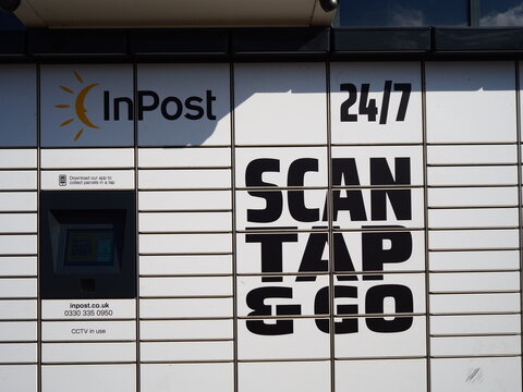 InPost sign and parcel drop off and collection point lockers 