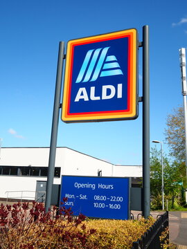 Aldi store sign against a blue sign with logo clear 