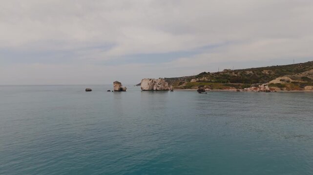Cinematic Drone Ascent Over Petra tou Romiou Rock Formation the Birthplace of Aphrodite in Cyprus