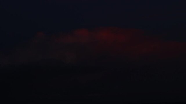 Day to night holy grail timelapse intense colors on the clouds during sunset.