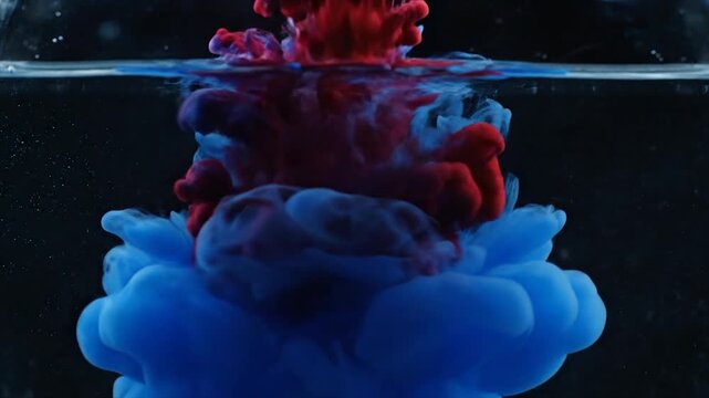 blue ink diffusion in water with dramatic backlighting abstract concept
