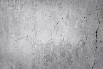 Obraz premium Light gray concrete wall texture with visible crack and stains. Rough industrial surface with natural imperfections and weathered details, suitable for grunge design, architecture and abstract backgro