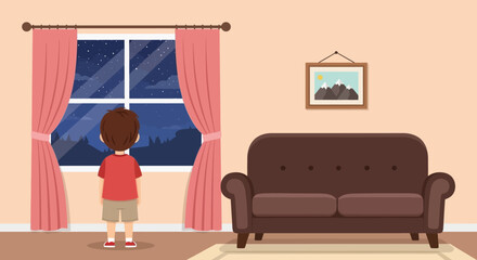 A young boy stands looking out a window at a nighttime landscape with mountains and stars © grvect02