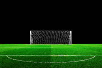 Fototapeta premium professional soccer goal stands on a lush, vibrant green grass pitch against a solid black background. Minimalist composition for sports concepts, design, creative advertising layouts. Penalty