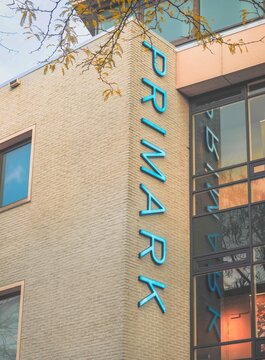 Sign of clothing store Primark at mall location during daylight hours in busy shopping area - Netherlands. Eindhoven 26-10-2025