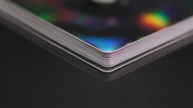 Close-up of cd corner with rainbow reflection
