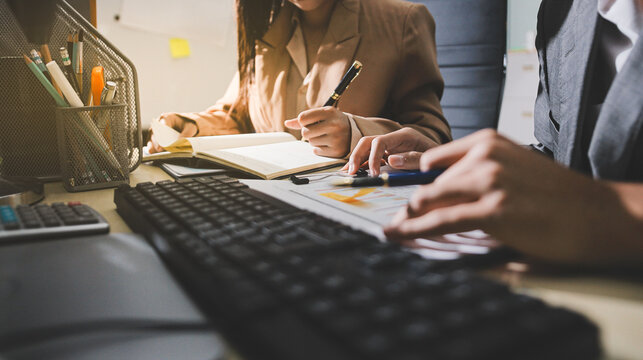 Accounting company provide finance and taxation planning for profitable cash flow, Auditor accountant working in office, analyze financial data and accounting record with calculator