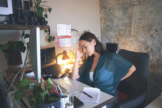 Headache, computer or woman with back pain in home office for burnout, debugging fail or remote work. Tech screen, freelance web designer and sore spine from muscle strain, stress and site test error