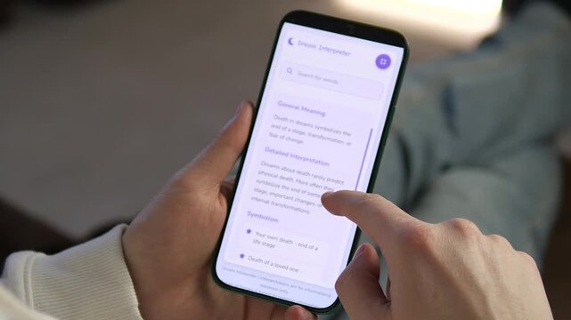 Discover subconscious secrets with a dream interpreter app. Close-up of hands scrolling through meanings like Death for transformation insights. Perfect for psychology, mental health, and modern