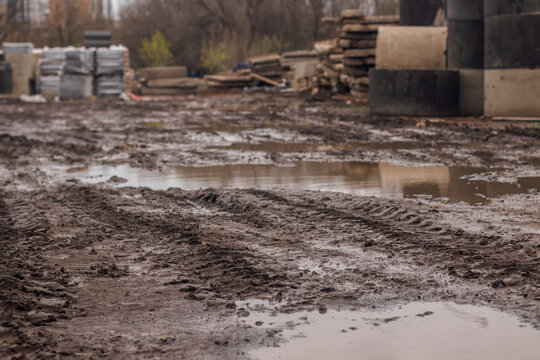 Truck tracks in spring mud at a construction site