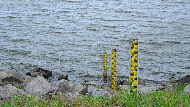 Hydrological water level measurement scales at Tha Koei Dam, Ratchaburi, monitoring system for irrigation and flood control.