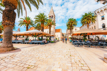 Fototapeta premium Historic center of Trogir, a UNESCO World Heritage site, with medieval stone architecture and the Cathedral of St. Lawrence, Dalmatia, Croatia.