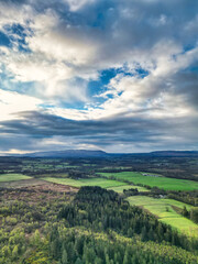 Obraz premium April 19th, 2026. Aerial View of Balmaha Valley Glasgow Landscape During Sunset Time. The village is a popular tourist destination for picnickers and day trippers from Glasgow