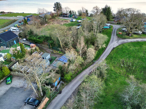 April 19th, 2026. Aerial View of Balmaha Valley Glasgow Landscape During Sunset Time. The village is a popular tourist destination for picnickers and day trippers from Glasgow