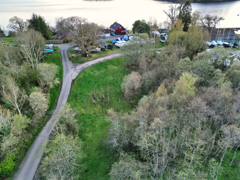 April 19th, 2026. Aerial View of Balmaha Valley Glasgow Landscape During Sunset Time. The village is a popular tourist destination for picnickers and day trippers from Glasgow