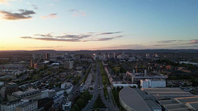 4K Aerial Tracking Drone Shot Flying Along Lloyd George Avenue, Cardiff, Featuring City View and Sunset