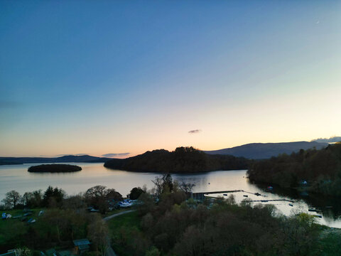 April 19th, 2026. Aerial View of Balmaha Valley Glasgow Landscape During Sunset Time. The village is a popular tourist destination for picnickers and day trippers from Glasgow