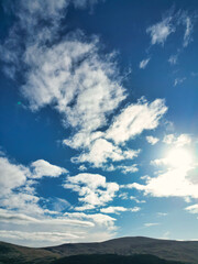 Obraz premium Gorgeous and Dramatic Sky and Clouds over Balhaha Valley Glasgow