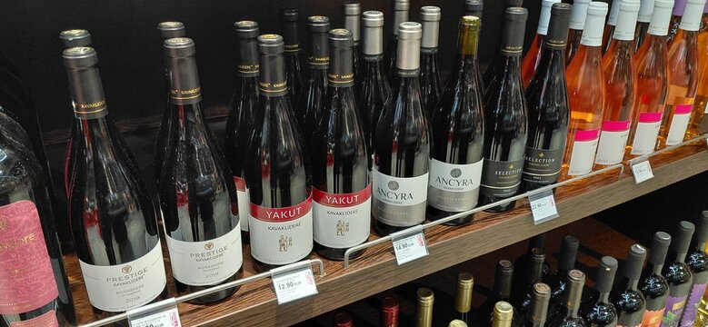 8 January 2026, Istanbul, Turkiye: Wine bottles of Kavaklidere, Yakut, and Ancyra brands displaying on a shelf in a retail store