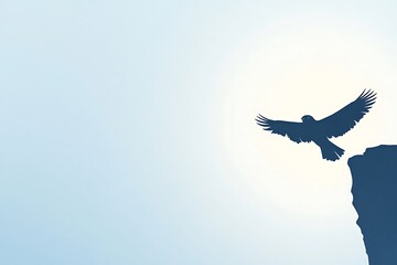 Obraz premium Silhouette of a bird soaring over a cliff