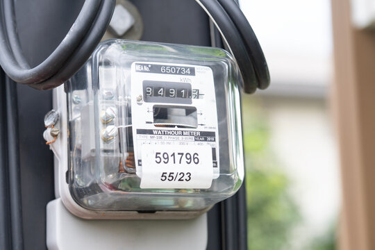 Electric measuring power meter for energy cost at home and office.