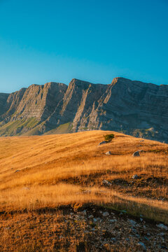 Majestic limestone cliffs of Mount Lebrsnik on the border of Bosnia and Herzegovina and Montenegro, scenic mountain landscape in the Dinaric Alps.